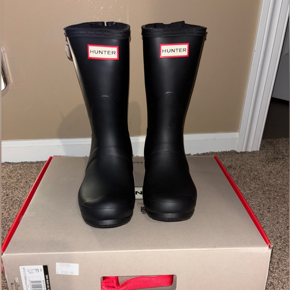 Never worn Hunter Black Boots. Brand new Luxury shearing insole included
